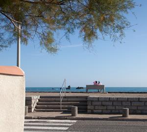 Cap d'Agde couple on bench